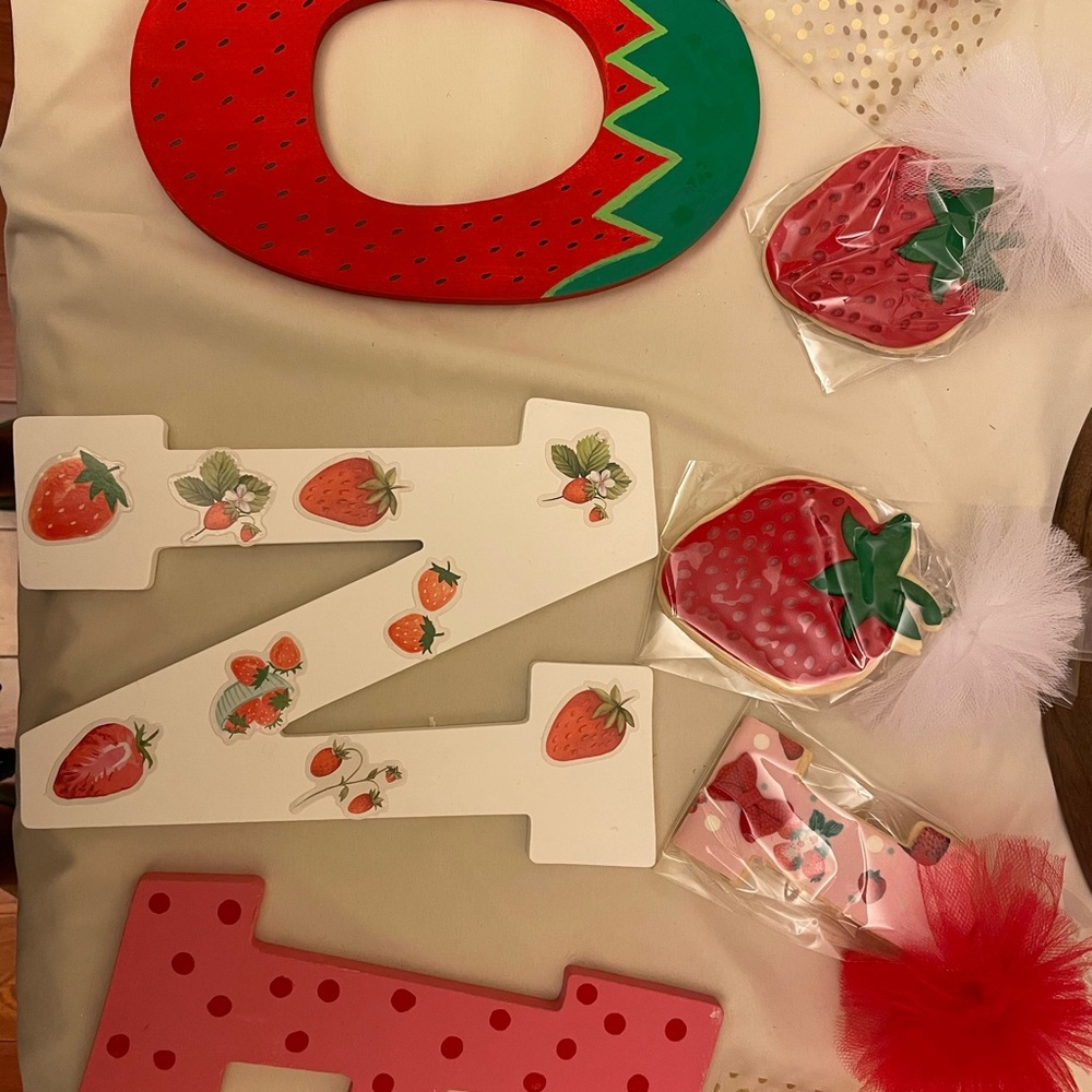 “A Berry Sweet 1st Birthday” party decor.